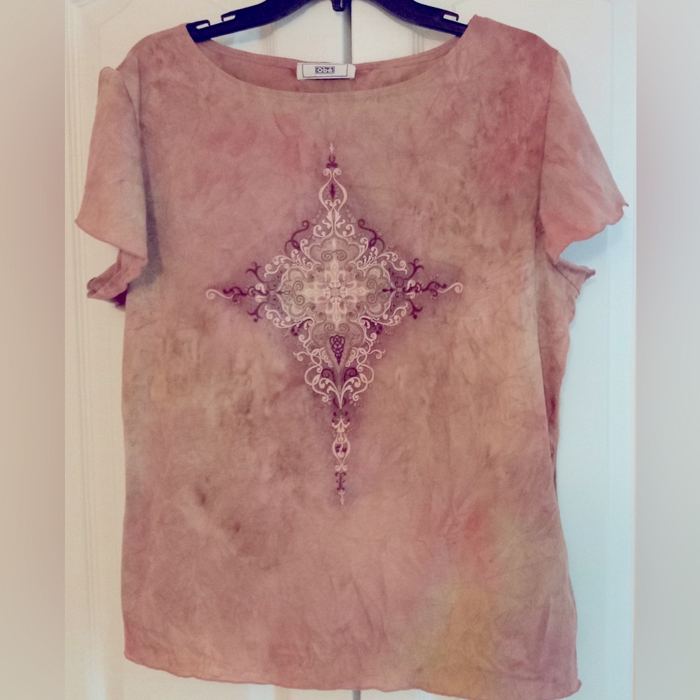 Light weight, versatile top with beading work.